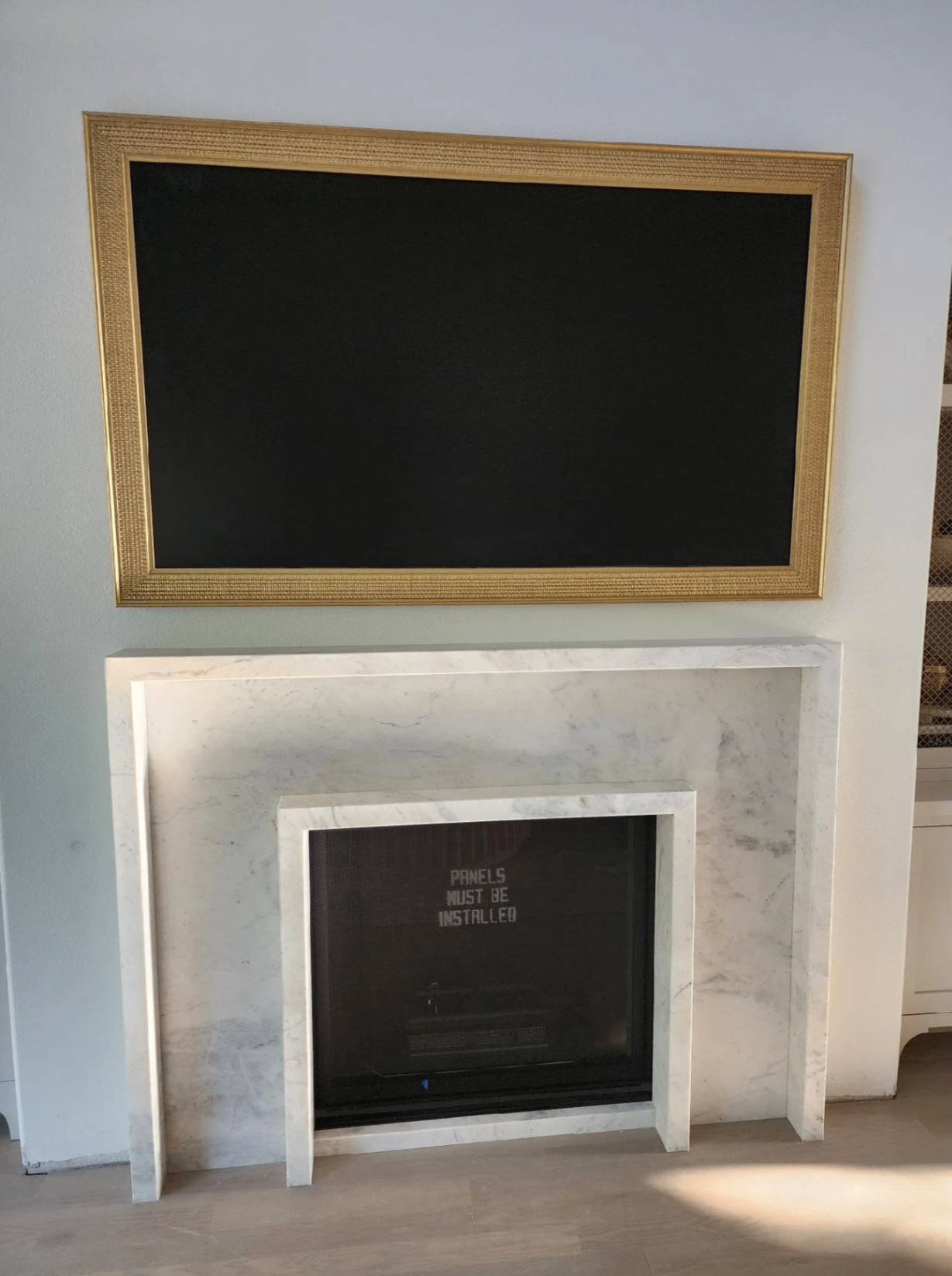 Clean marble surround with precise mitered edges